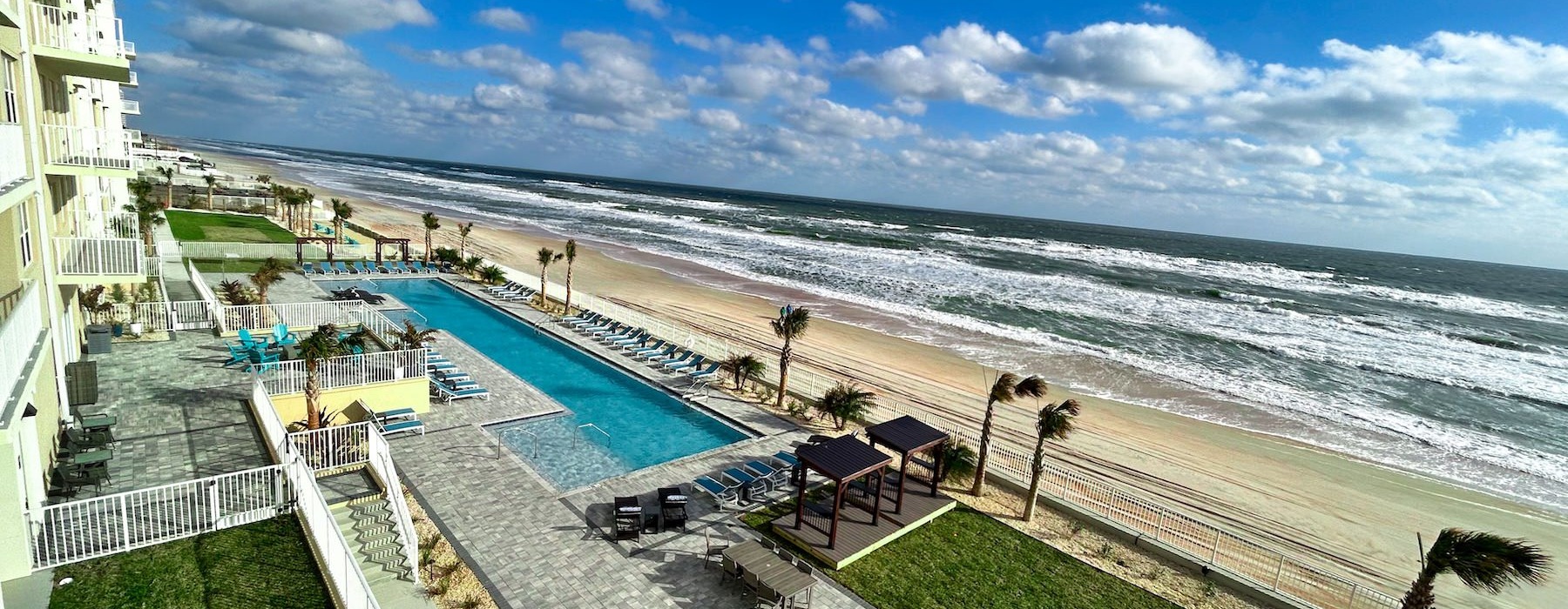 a beach with a building